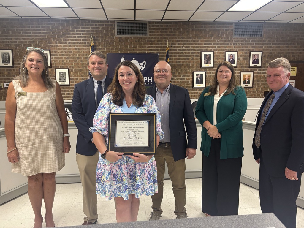 Caroline McKee, RCSS Career and Technical Education Teacher of the Year, was recognized at last week's board meeting for being named a North Carolina Center for the Advancement of Teaching (NCCAT) 2027 Burroughs Wellcome Fund North Carolina Career and Technical Education (CTE) Teacher of the Year Finalist.  Dr. Brian Toth, principal of Trinity High School; Dr. David Cross, Randolph County Schools’ Director of Career and Technical Education; Nancy Cross from the North Carolina Department of Public Instruction; Misty Wolfe from the North Carolina Department of Public Instruction;  and Dr. Brock Womble from NCCAT joined us in support of Ms. McKee. We are grateful for their presence as we honored Ms. McKee!