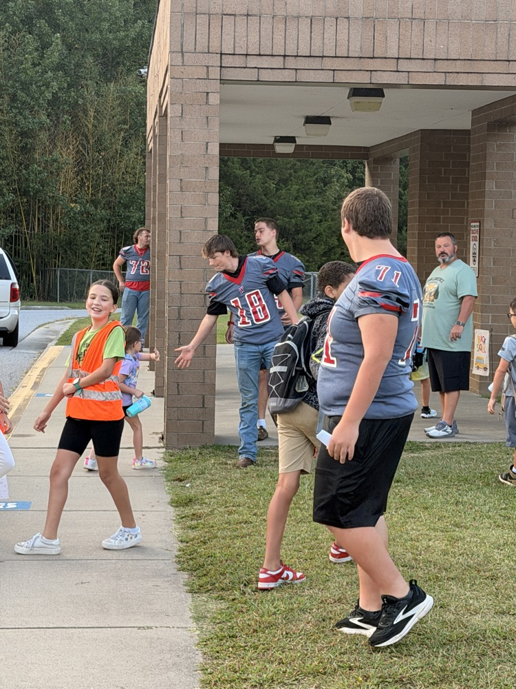 We had some extra help with our car rider line this morning!  Some Wheatmore football players came to greet our students this morning and invite them to the game tonight!