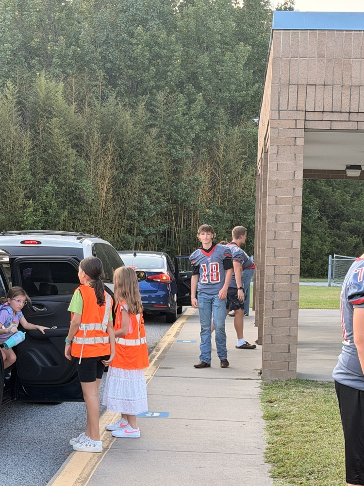 We had some extra help with our car rider line this morning!  Some Wheatmore football players came to greet our students this morning and invite them to the game tonight!