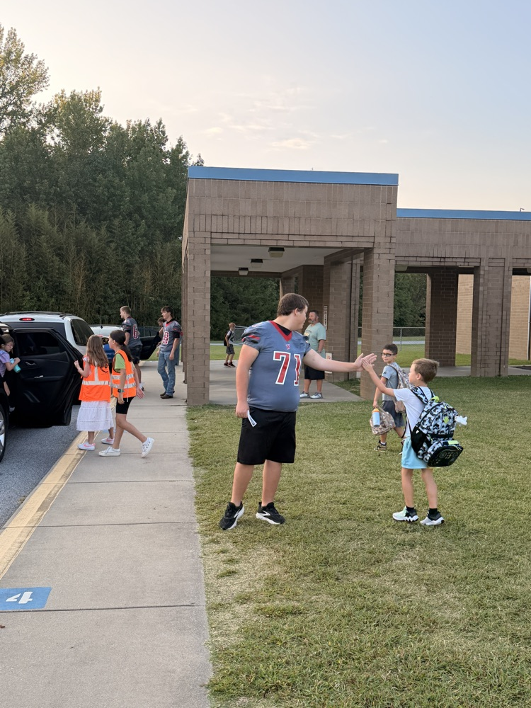 We had some extra help with our car rider line this morning!  Some Wheatmore football players came to greet our students this morning and invite them to the game tonight!