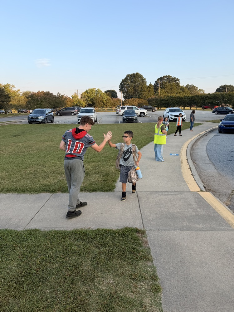 We had some extra help with our car rider line this morning!  Some Wheatmore football players came to greet our students this morning and invite them to the game tonight!