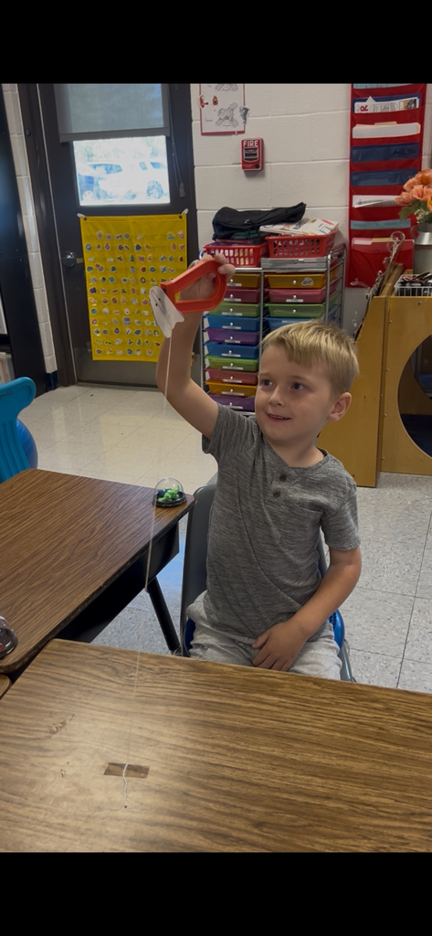 First grade has been learning about force and motion in science this week. Today, they did an experiment with magnets to see if they could make their ghost “fly” without touching it. 👻