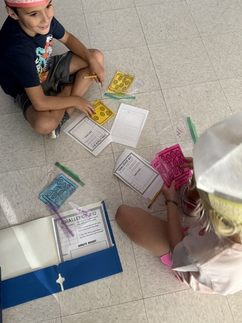 2nd grade wrapped up our graphing and data unit by becoming bakers with our Donut Shop!