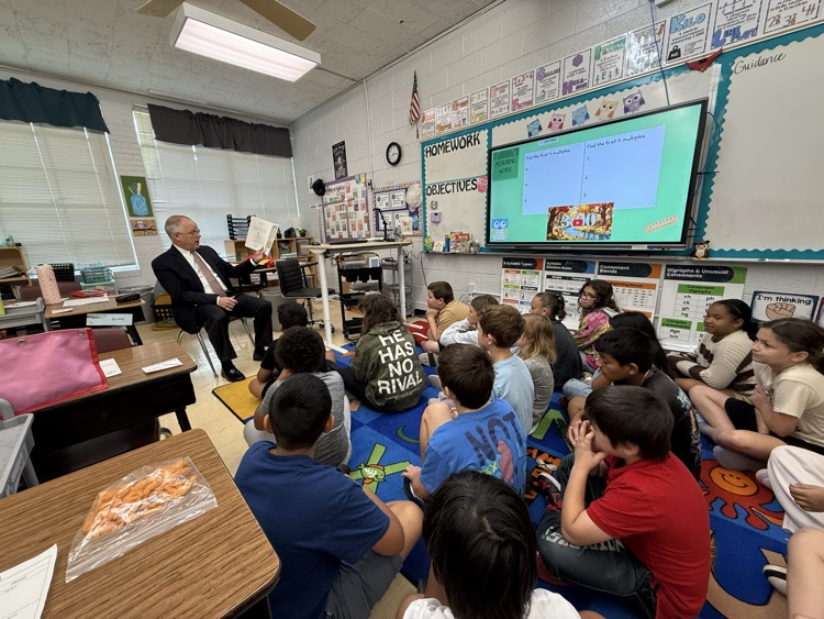 4th grade class listening to a read aloud. 
