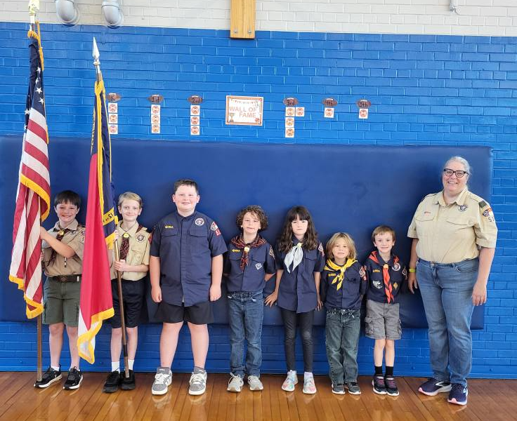 911 ceremony and students put flags in Sandy's Garden 