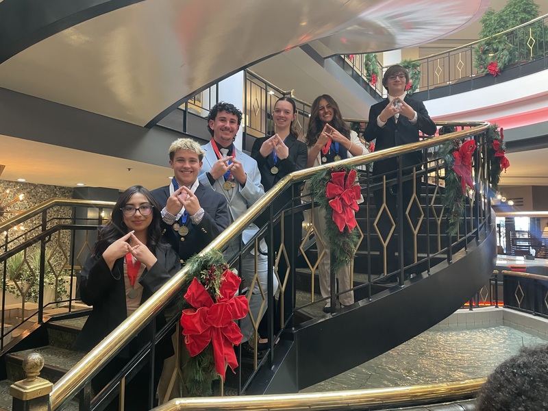 RHS DECA Shines at NC Districts with Six Placements and Platinum Status