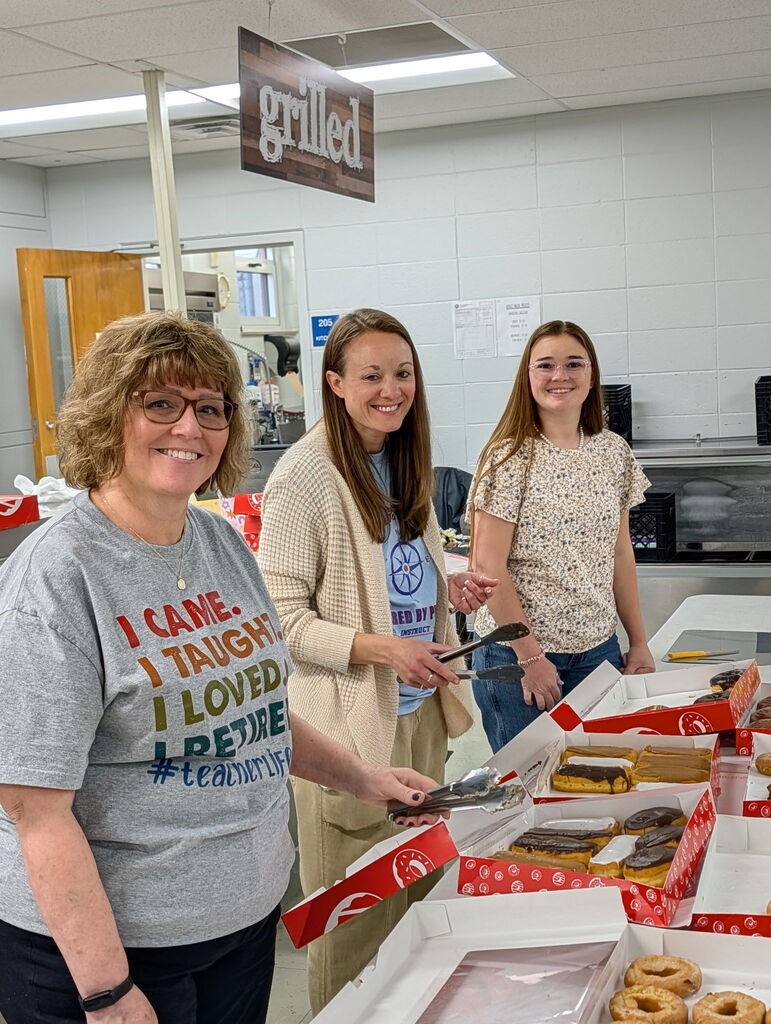 Faculty and staff helped serve breakfast at the Buddy Breakfast.