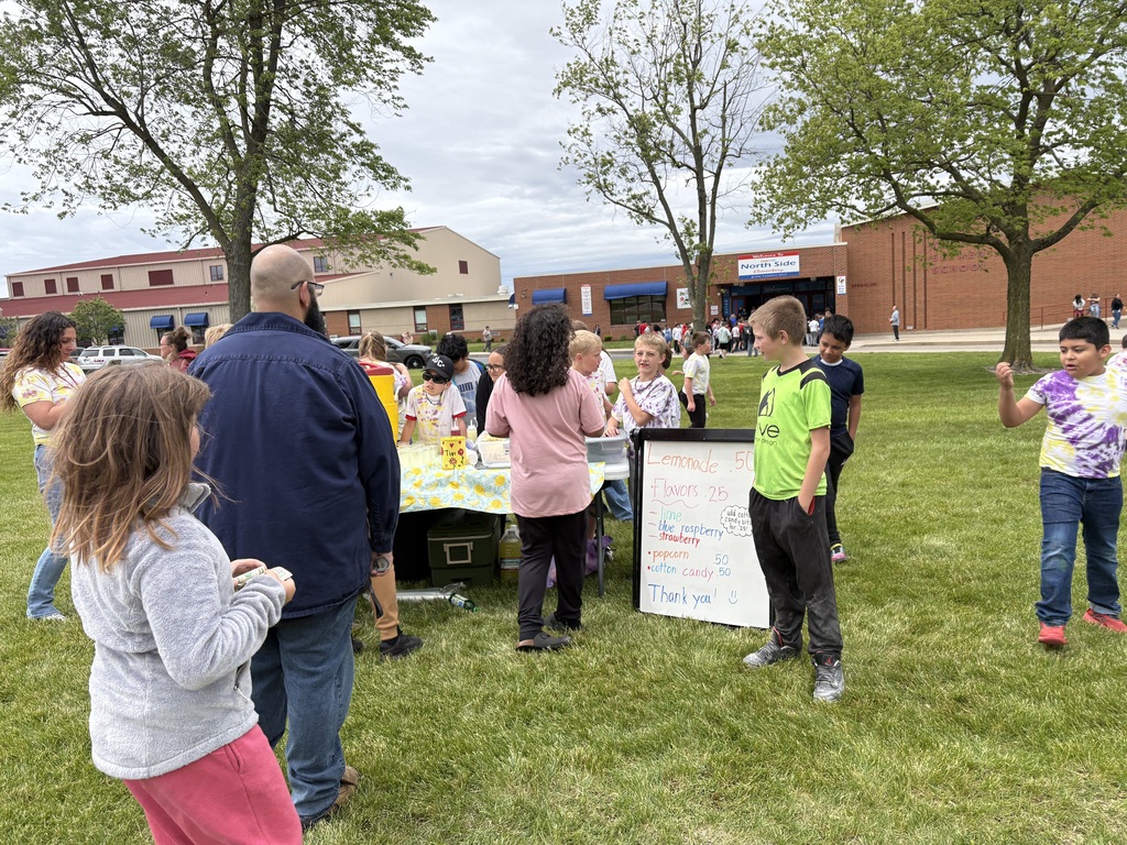 A third grade class at their lemonade day stand.