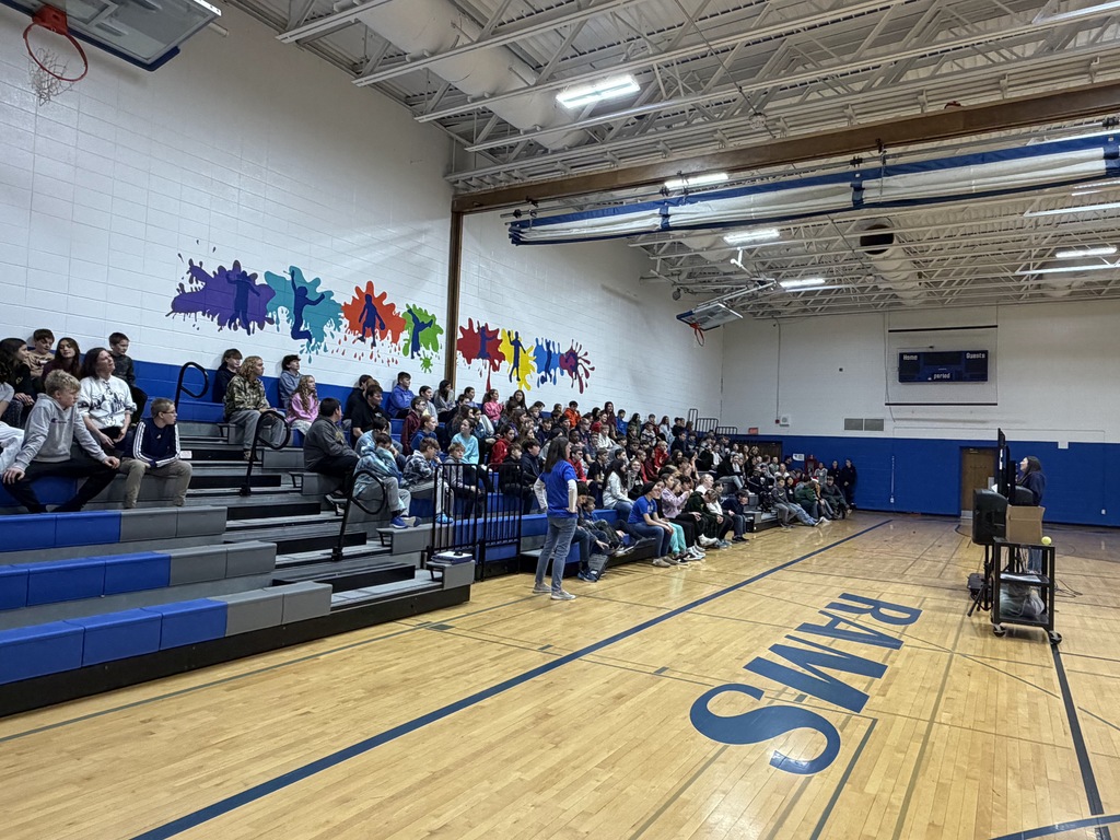 middle school students took part in a trust-building and teamwork activity during an assembly