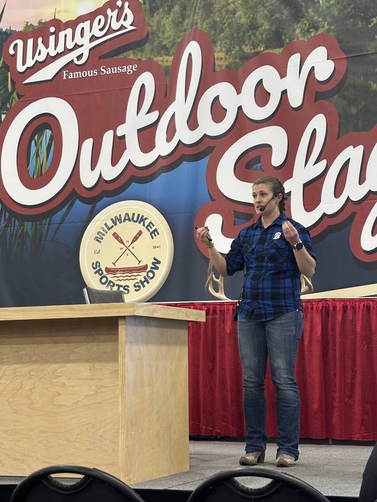 Natalie Weeks speaks at the Milwaukee Journal Sentinel - Sports Show