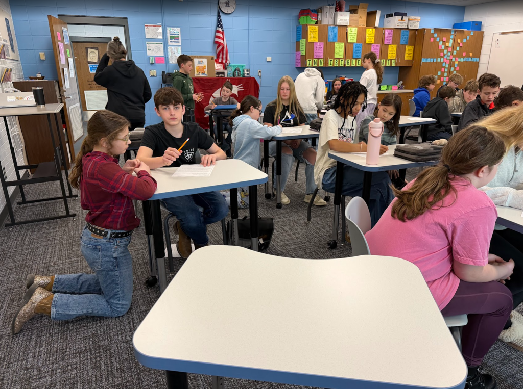 Mrs. Thomas’ 8th grade math class recently invited the 5th graders in to help them graph their screen time.