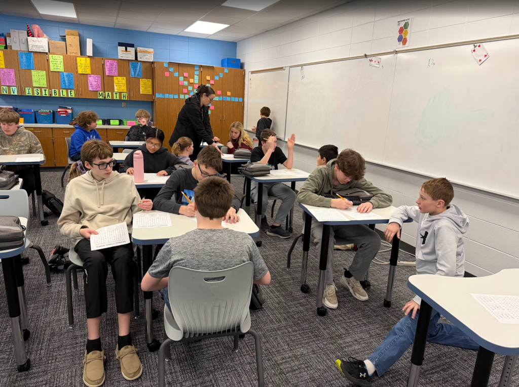 Mrs. Thomas’ 8th grade math class recently invited the 5th graders in to help them graph their screen time.