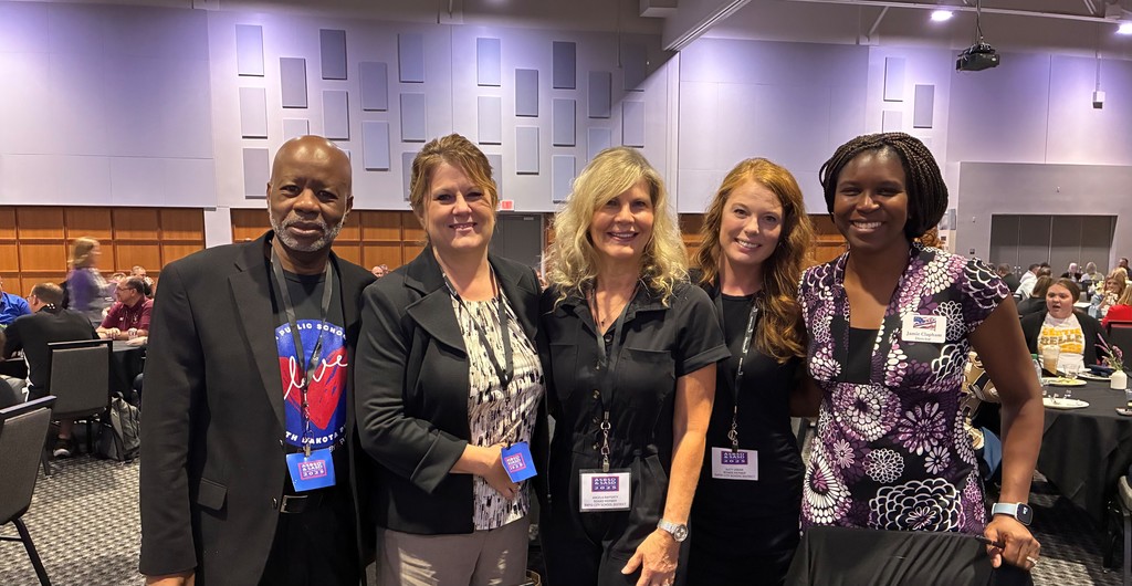 Bishop carr, superintendent, angela rafferty, katy urban and jamie clapham