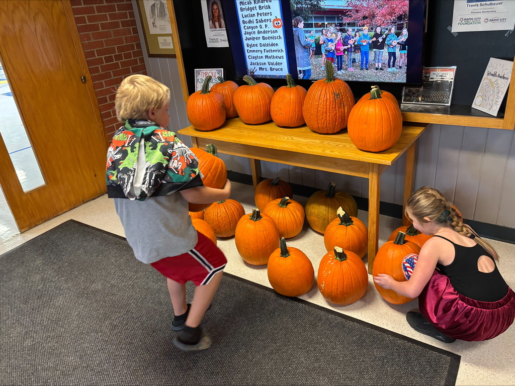 students helping unload