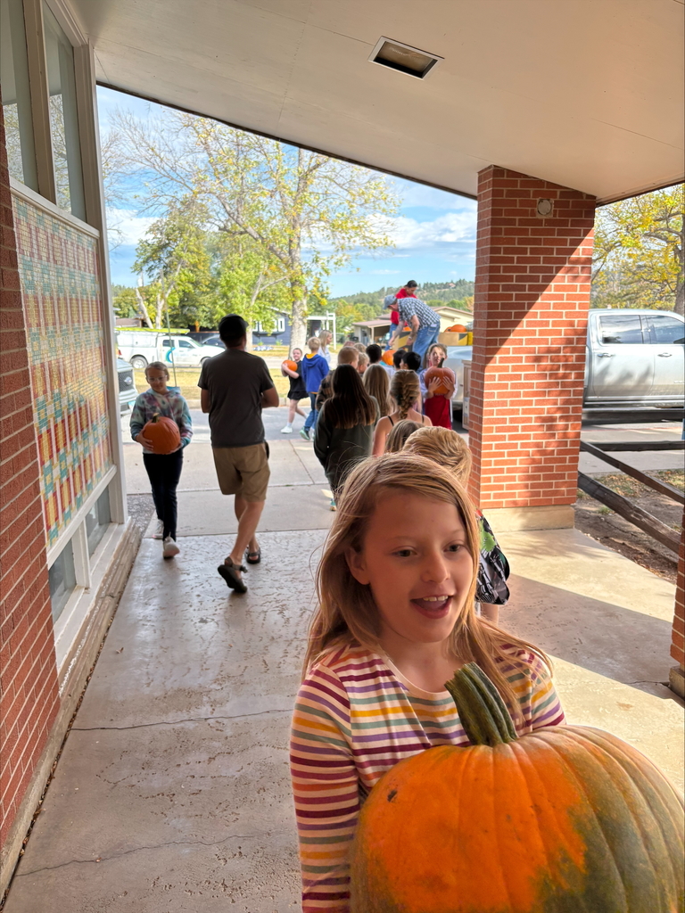 students helping unload