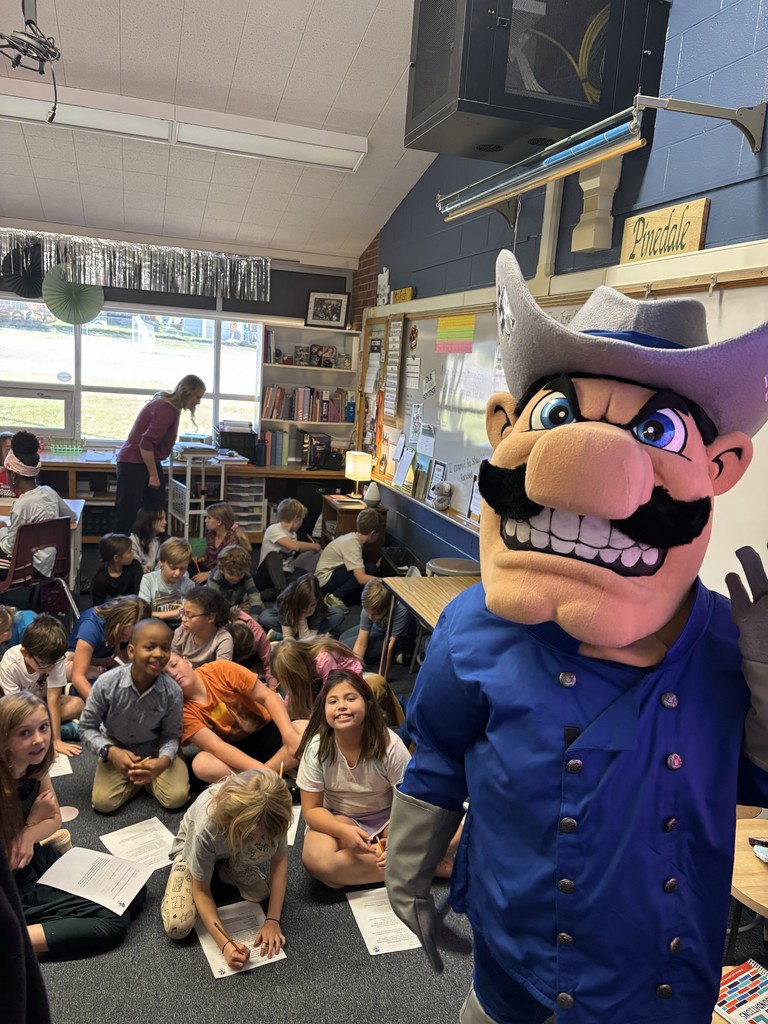 students and Raider mascot