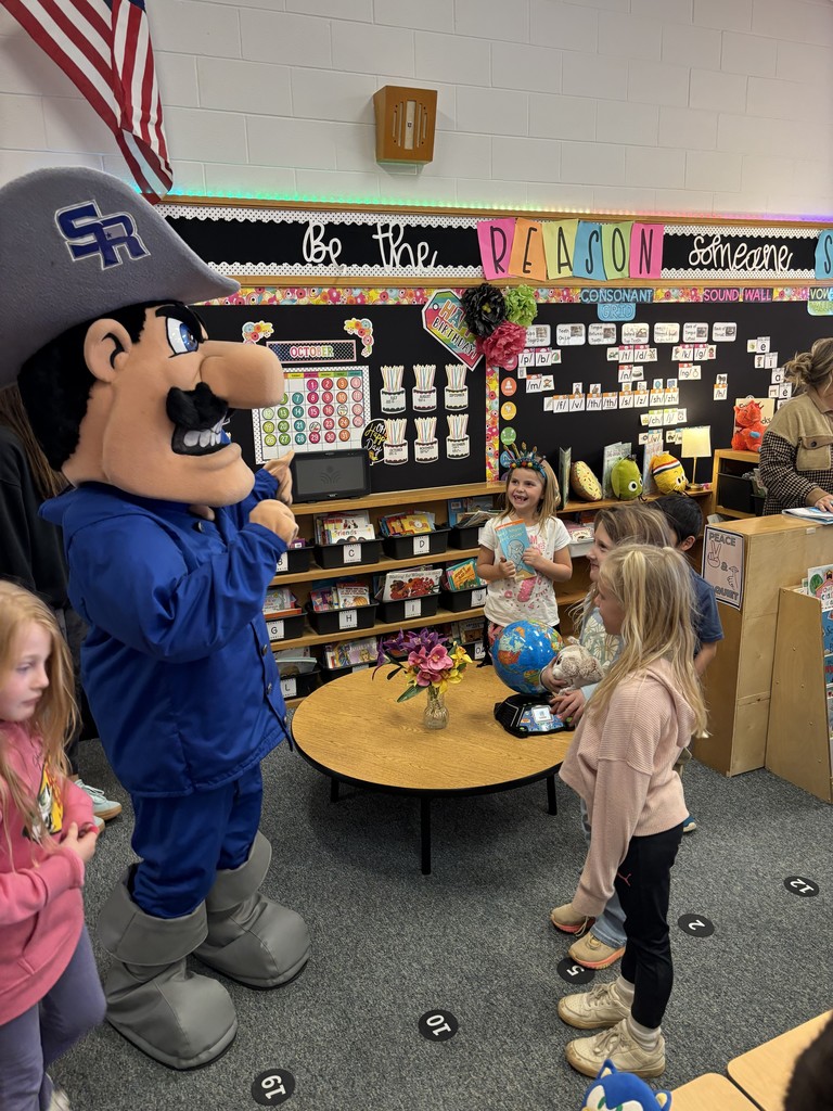 students and Raider mascot