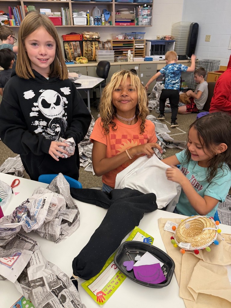 students making scarecrows 