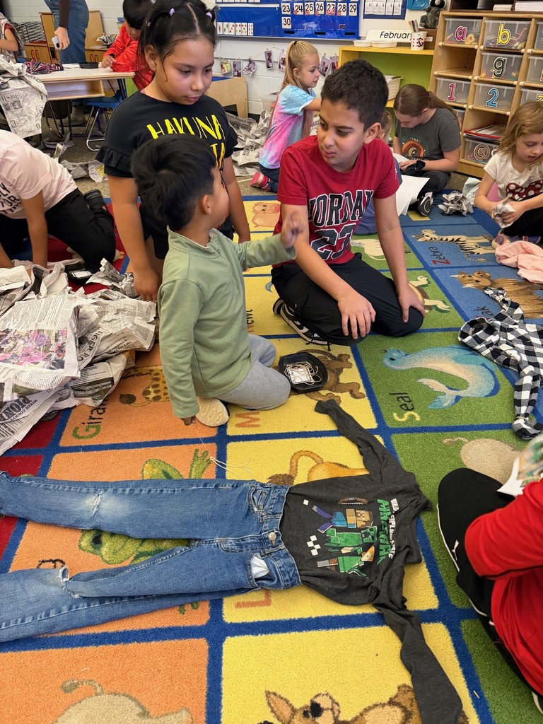 students making scarecrows 