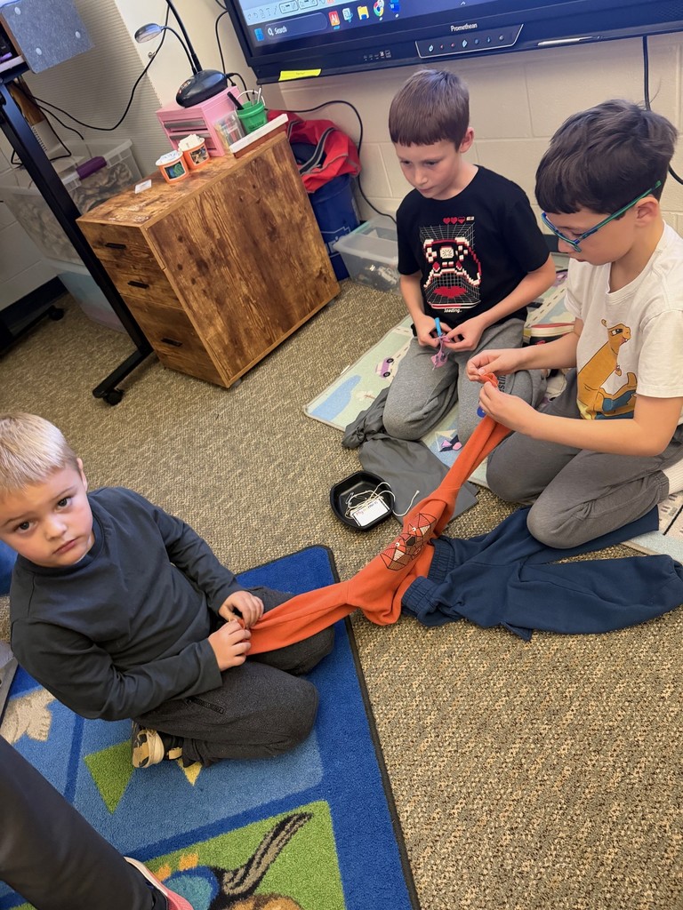 students making scarecrows 