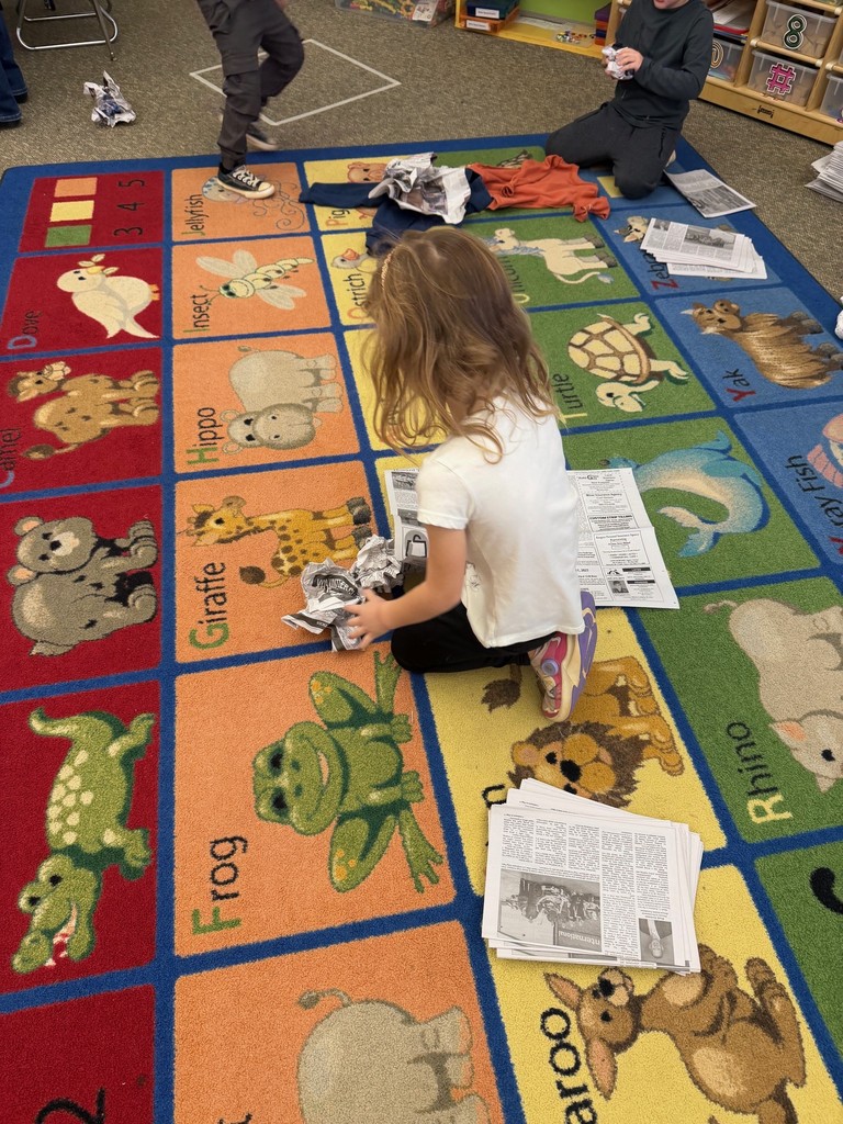 students making scarecrows 