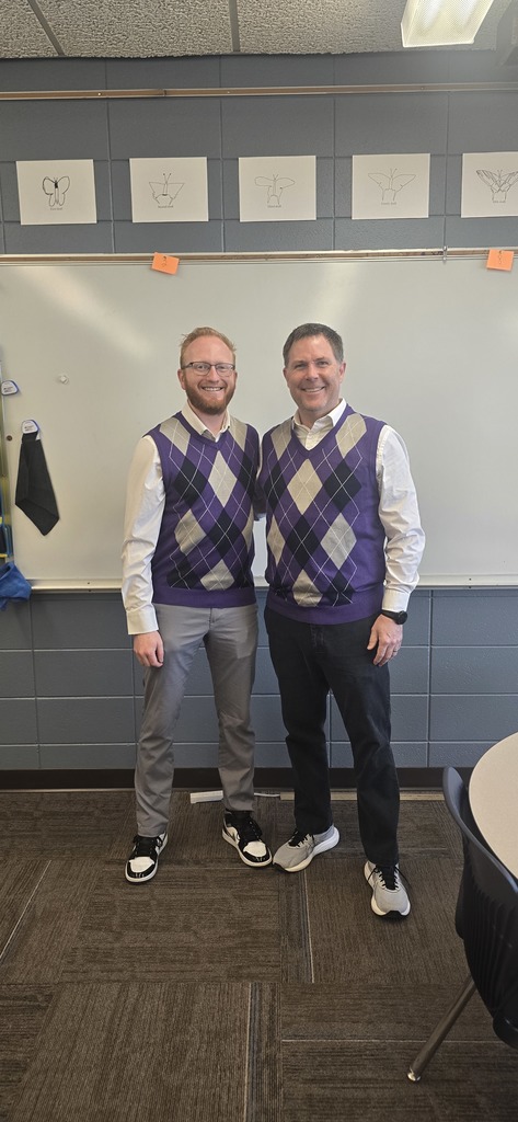 Photo of staff in purple