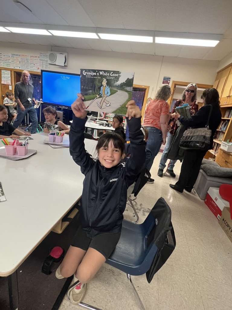 student excited about her book