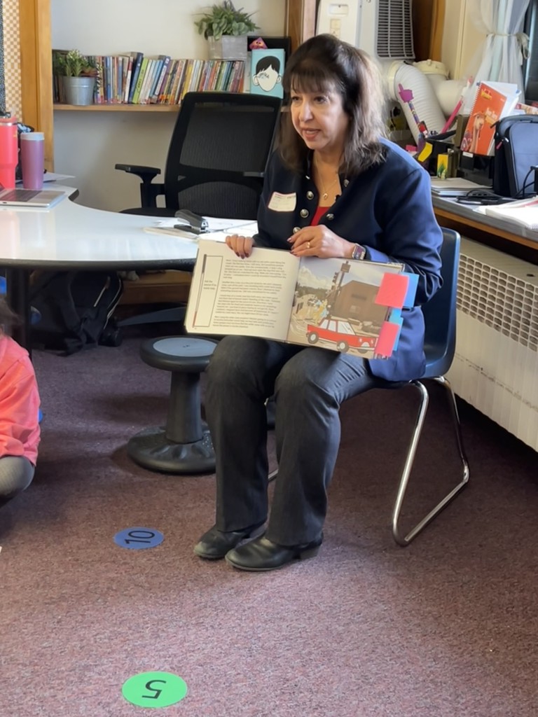 adult reading a book