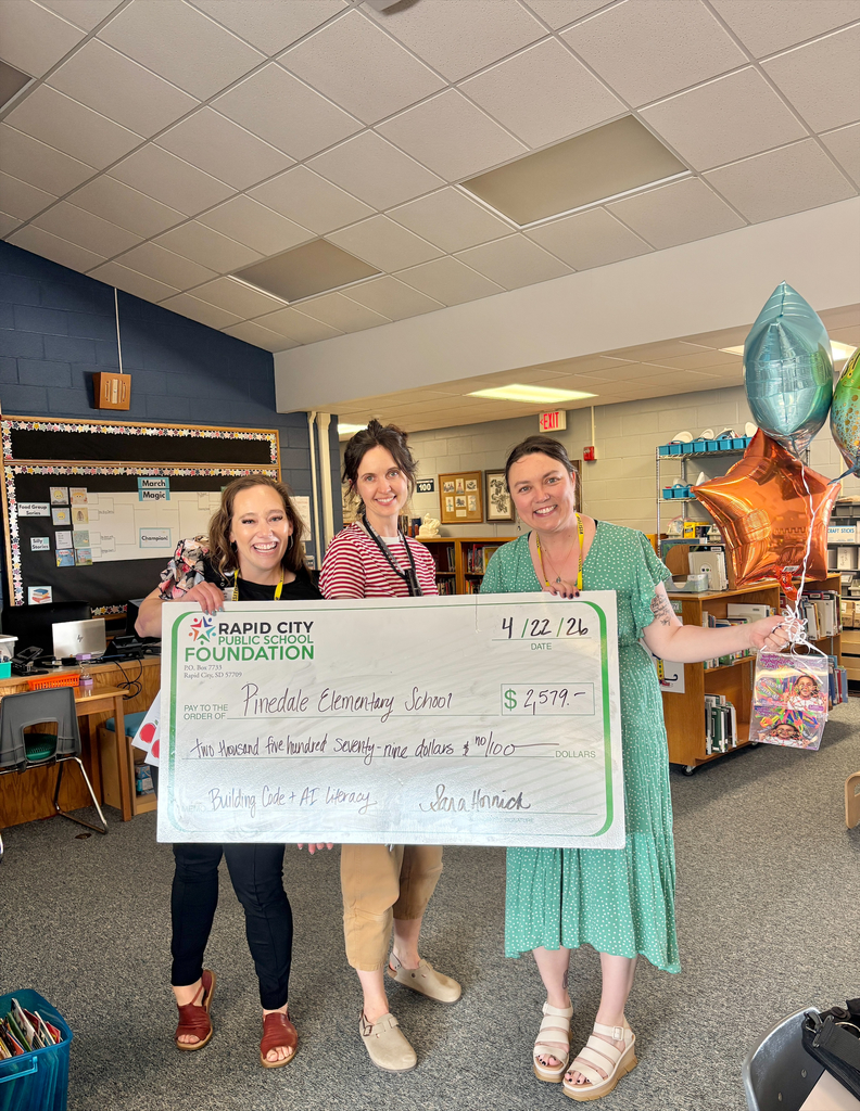 staff with giant check