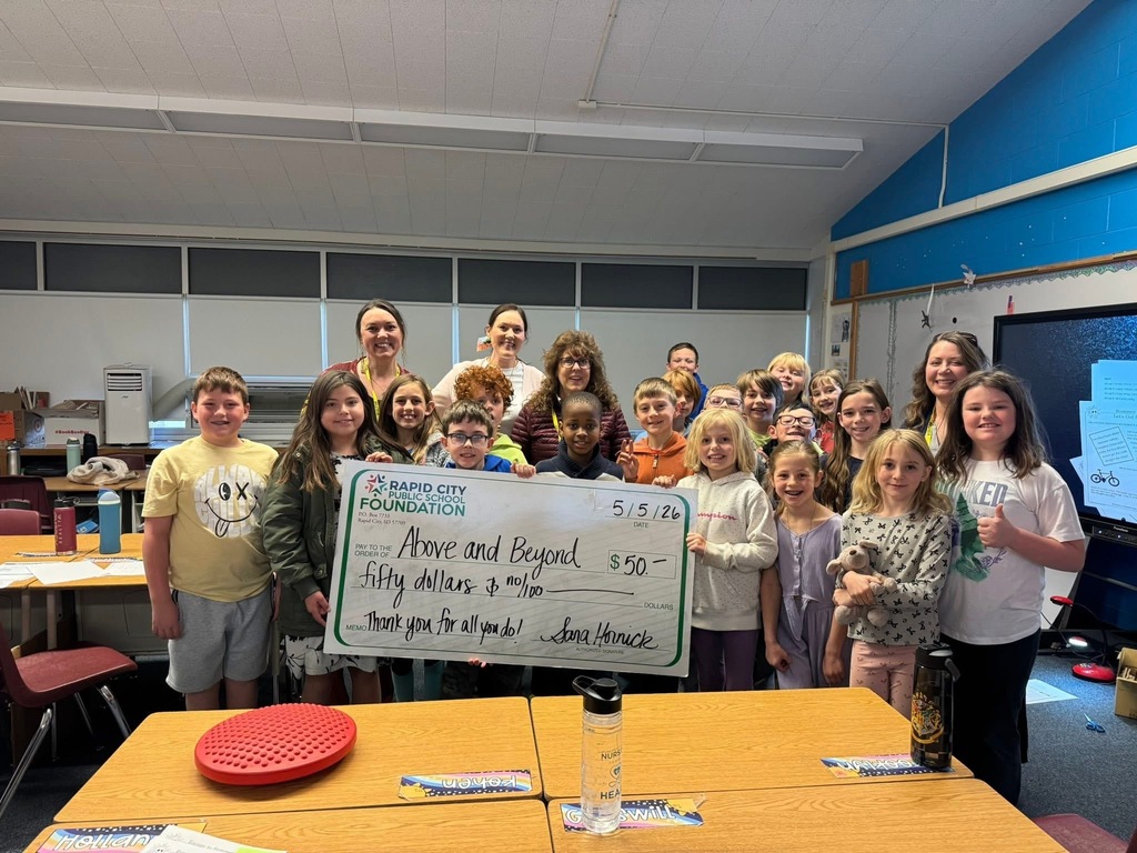 staff pic with large check