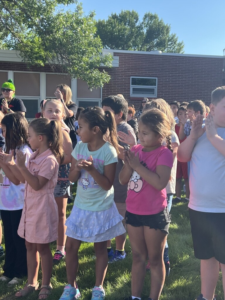 Students clapping