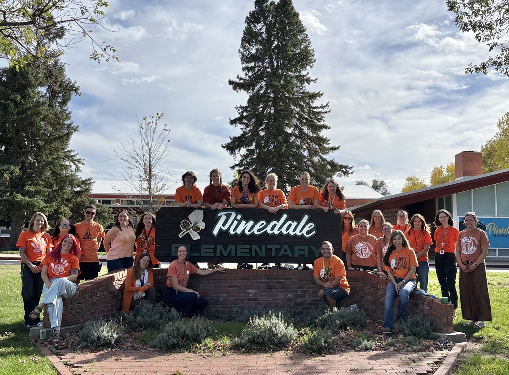 staff in orange
