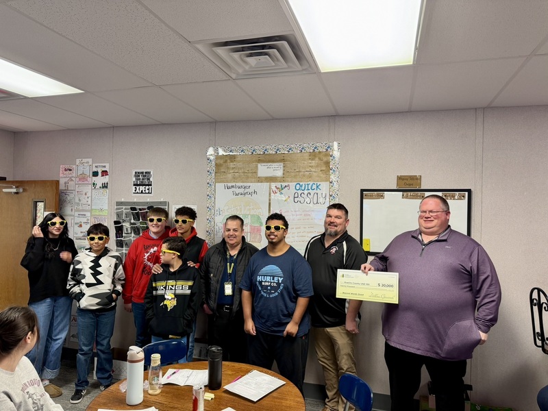 Students with USD 105 Admin, Dollar General with the check