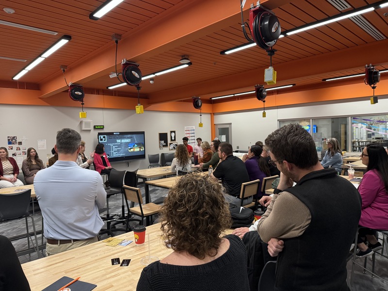 Educational Leaders Listen to a Presentation in the LEAD Center