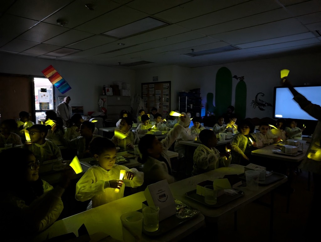 class with glow sticks