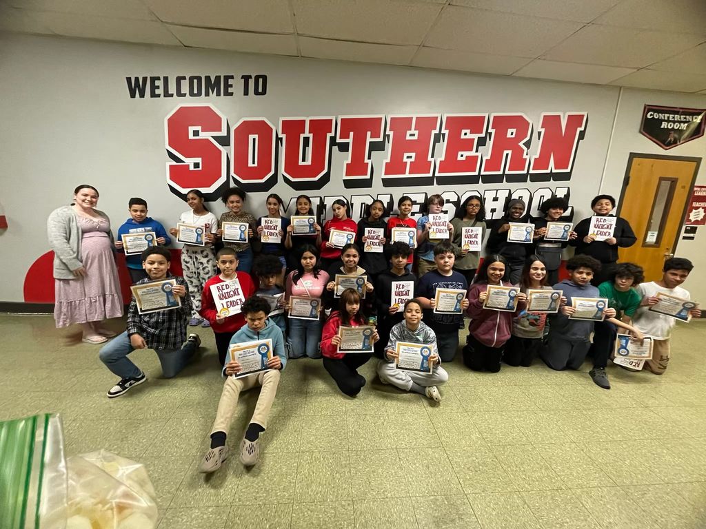 Mrs. Mazur and her students with their published book!
