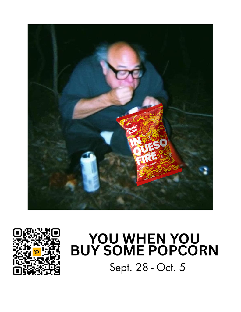 Danny Devito in the woods eating popcorn