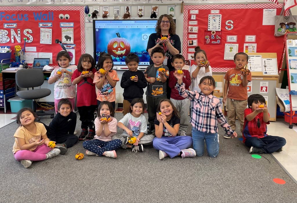 Mrs. Reller's class painted mini pumpkins, grown in Mrs. Reller's Garden!
