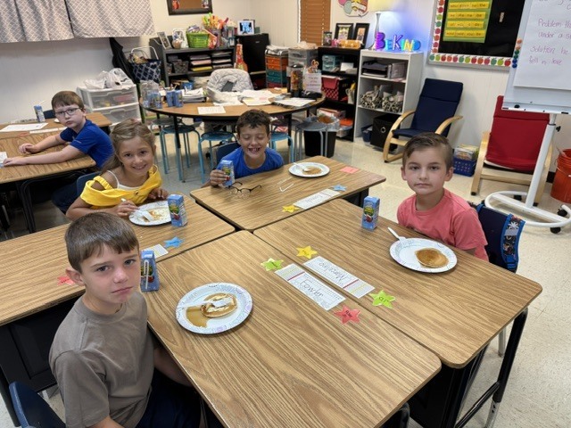Children eating their flapjacks