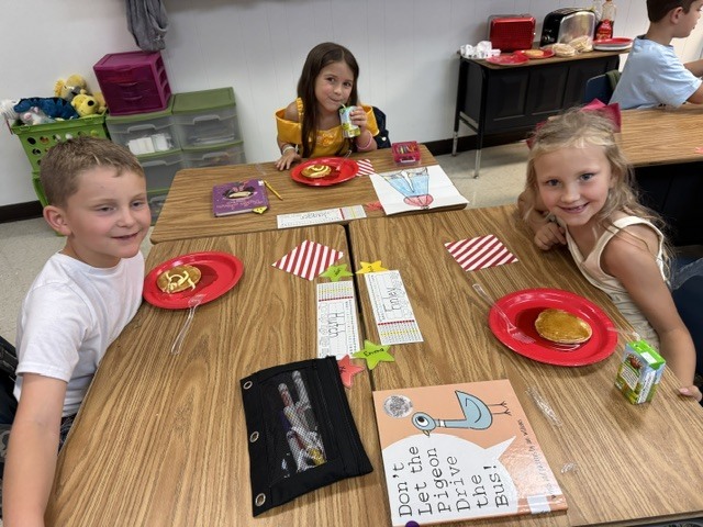 Children eating their flapjacks