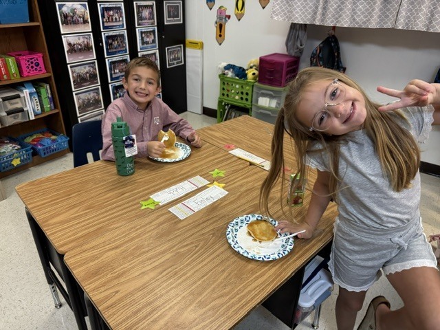 Children eating their flapjacks