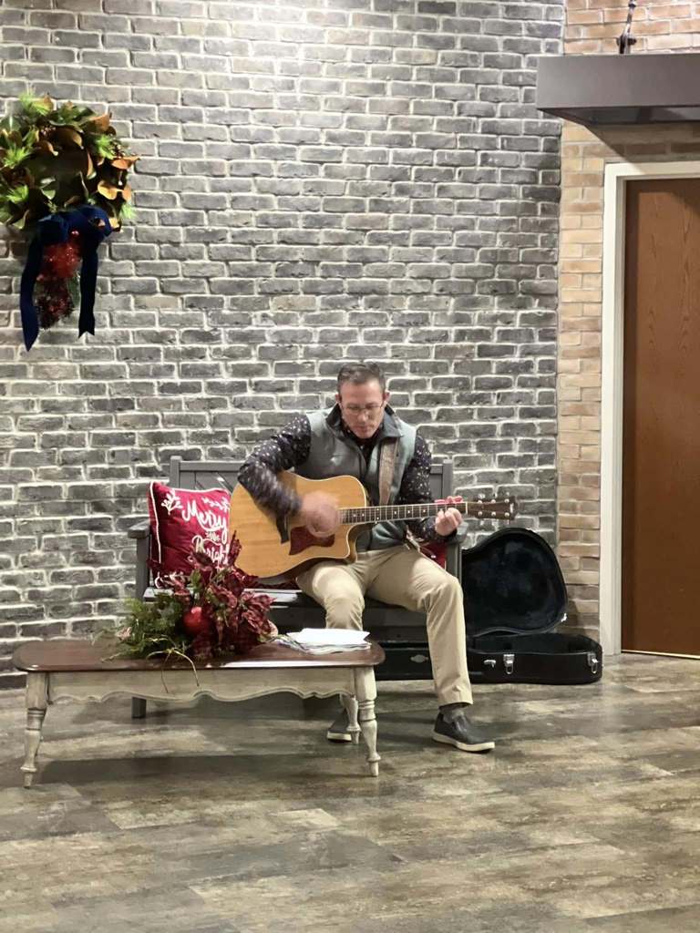 Mr. Pollock-Christmas Caroling at Elk  Crossing with HC students