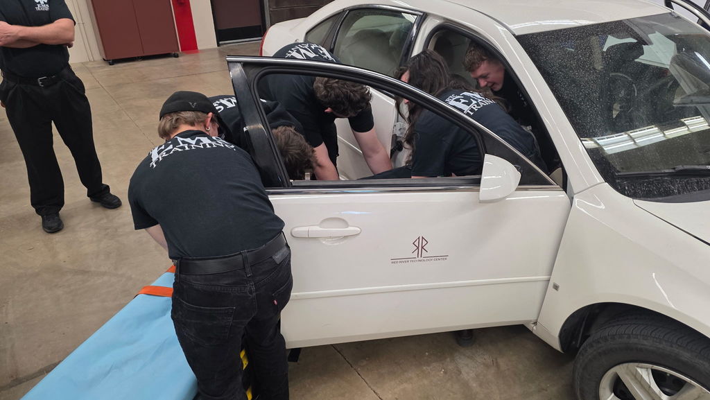 EMS Students Patient Packaging,  Extraction, and Backboarding