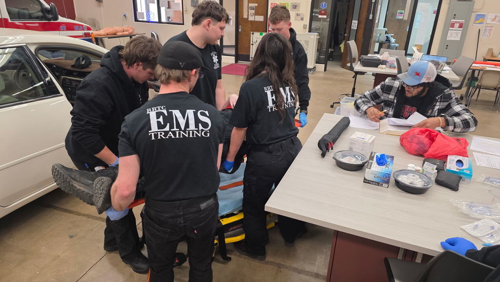 EMS Students Patient Packaging,  Extraction, and Backboarding