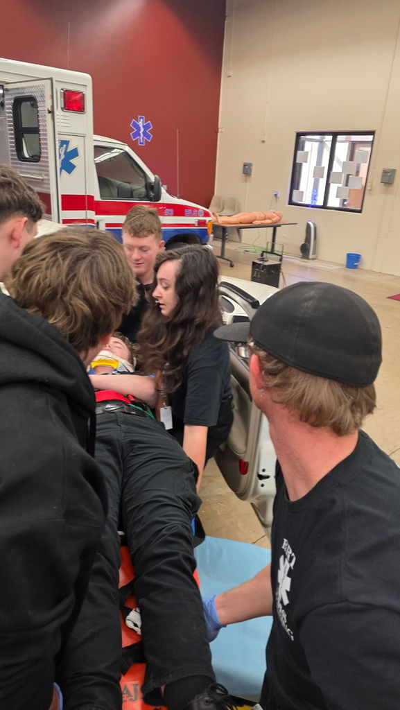 EMS Students Patient Packaging,  Extraction, and Backboarding
