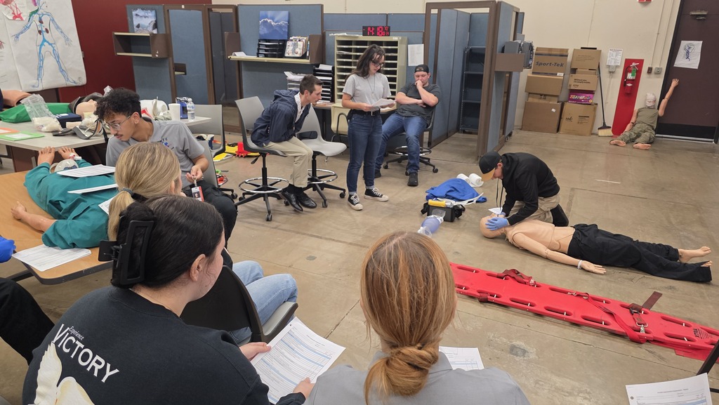 Former EMS students helping with skills