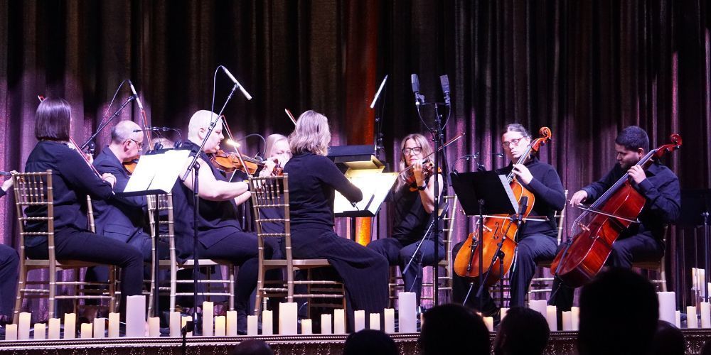 symphony members performing on stage