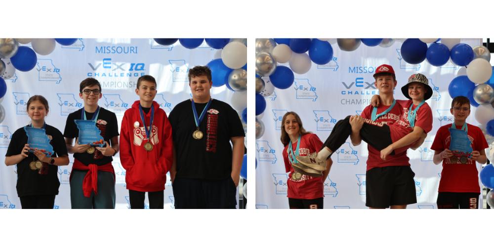 8 students with medals around necks