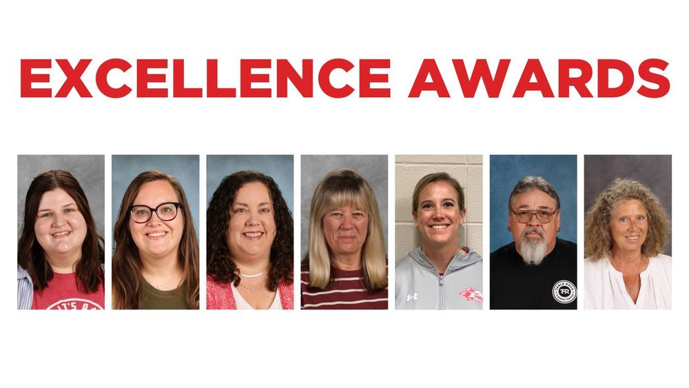 six women and 1 man smiling