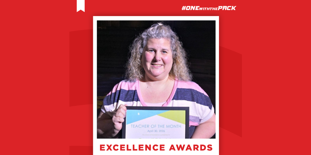 Cyndi Trimble holding a certificate